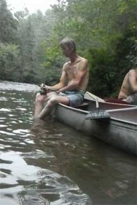 Brian in a canoe