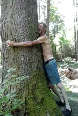 Brian hugs a tree