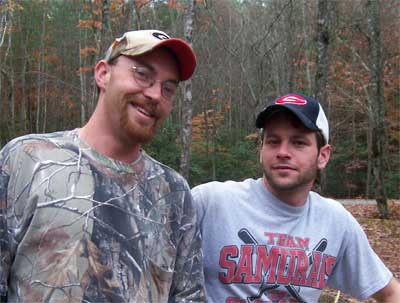 two young men in camo