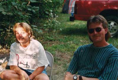 Girl and guy sitting in chairs