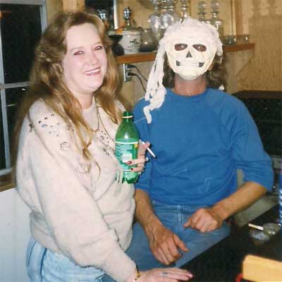 woman and man at a Halloween party