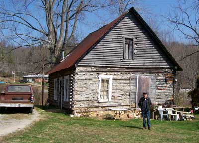 Lee Payne at his log cabin
