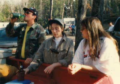 Rick, Jill, and Brenda beside the beer cooler