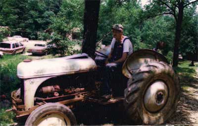 Sib Harkins on a tractor