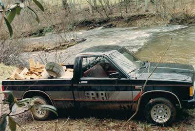 Pickup truck with firewood at Trout Camp