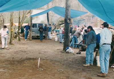 tarps cover the horseshoe pits
