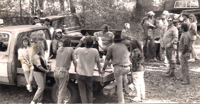 People at a party in the woods