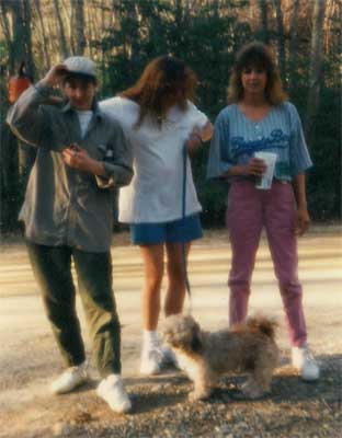 three women and dog