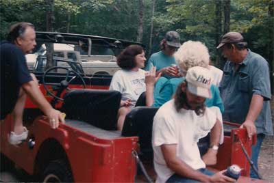 Ann and a red Jeep