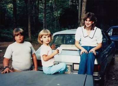 Sitting on cars at the End of the Pavement