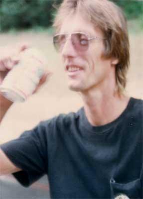 Brian Payne drinks a beer