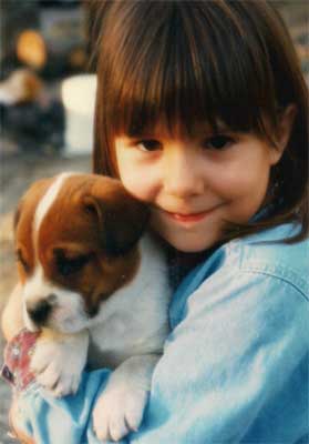 little girl with puppy
