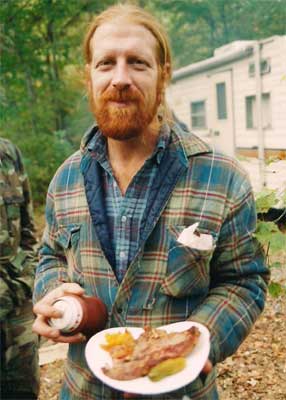 man with plate of food