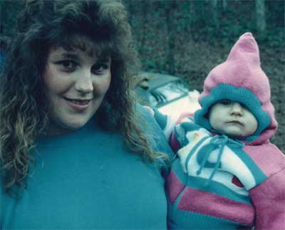 woman with baby in pink and blue