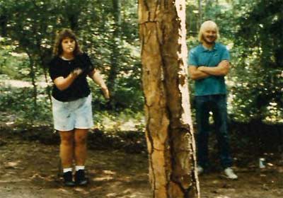 Diane and Gary play a game of horseshoes.