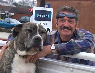 man and dog at Foodland