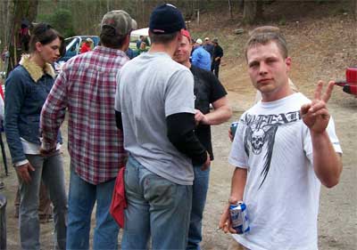 young man with peace sign