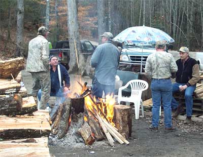 campfire and a stack of wood