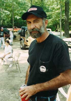 Frank Rogers in ball cap