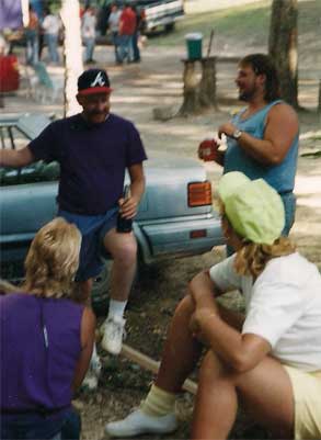 Men and women meet up in the woods