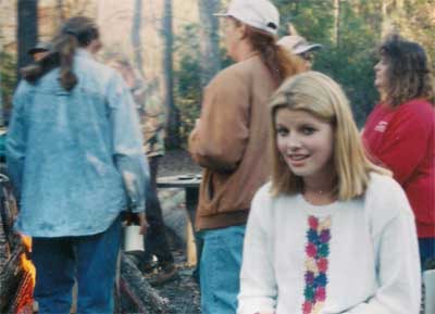 Leanne with ladies around the fire