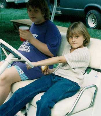 Lisa and Candice in golf cart