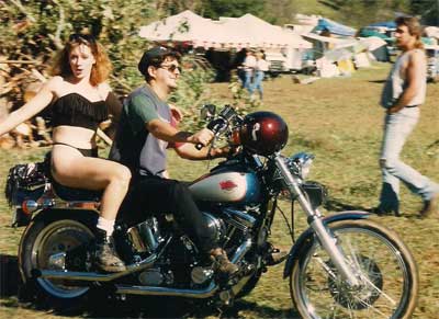 girl and man on motorcycle