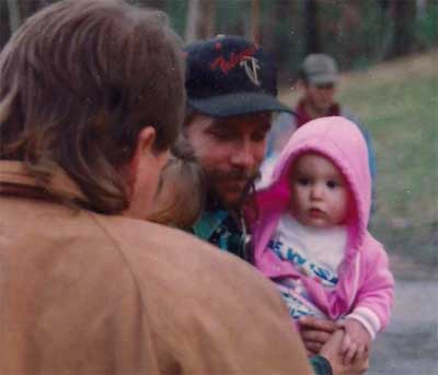 man holding baby