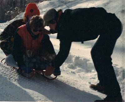 sledding in the snow