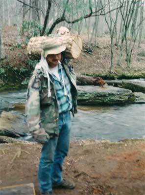 Bringing in firewood at Trout Camp