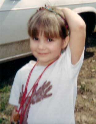 Natalie with ribbons and t-shirt